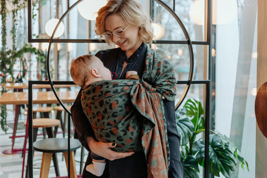 image of woman holding baby