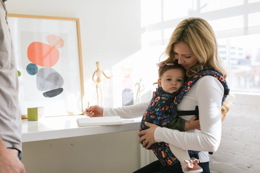 image of woman holding baby