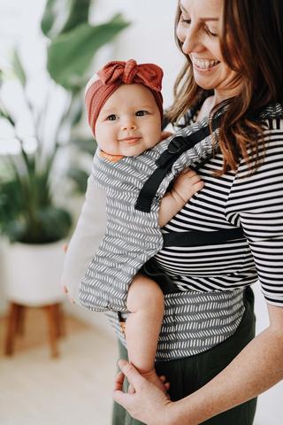 image of woman wearing a carrier