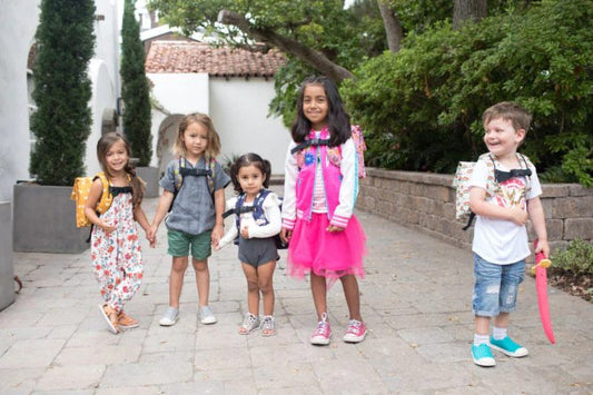 image of children wearing backpacks