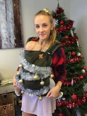 image of woman wearing christmas decorations