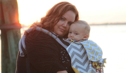 woman holding baby 