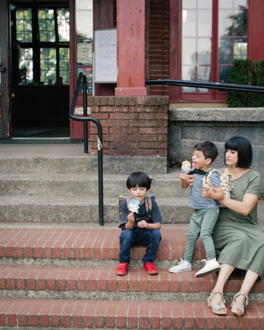 image of family outside eating ice cream