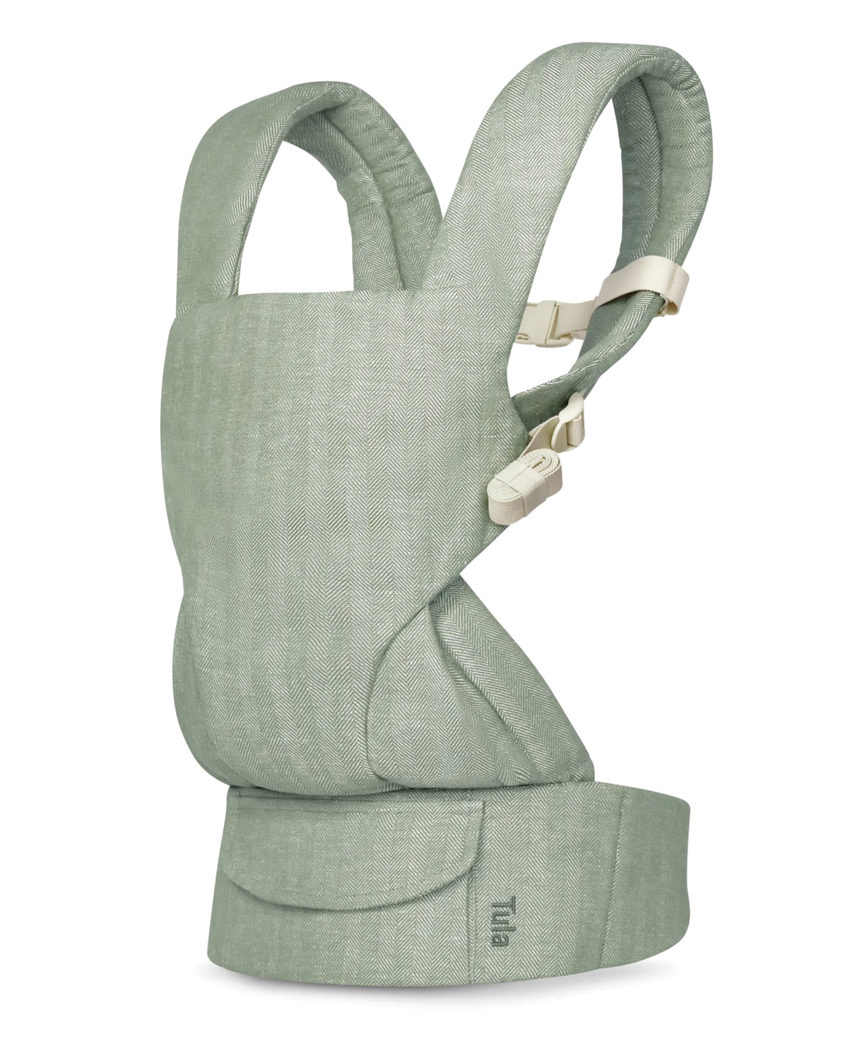 A sage green linen baby carrier with a textured linen-like fabric, cream plastic buckle closures, and a small black 'Tule' brand logo on the front waistband, shown against a plain white background.