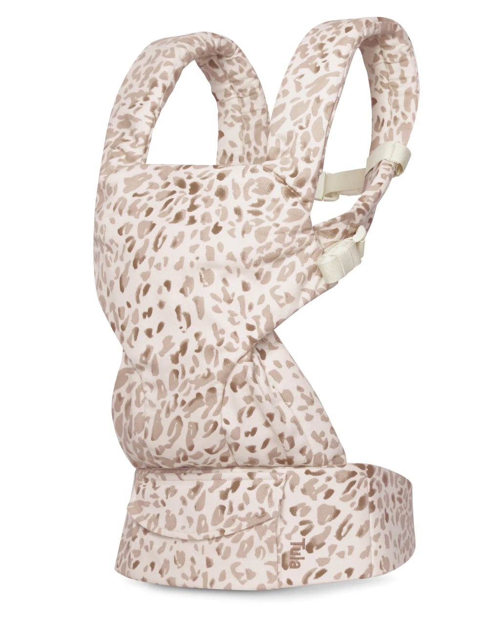 A linen baby carrier with a beige and brown leopard print pattern, shown from a side profile view against a plain white background.
