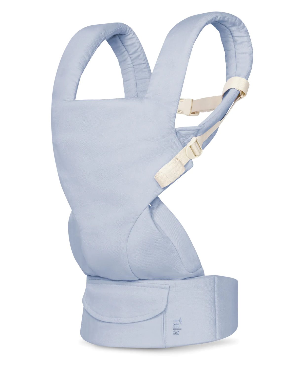 A light blue linen baby carrier seat pad by Tula, featuring adjustable cream-colored straps and a matching waist belt, shown on a solid white background.