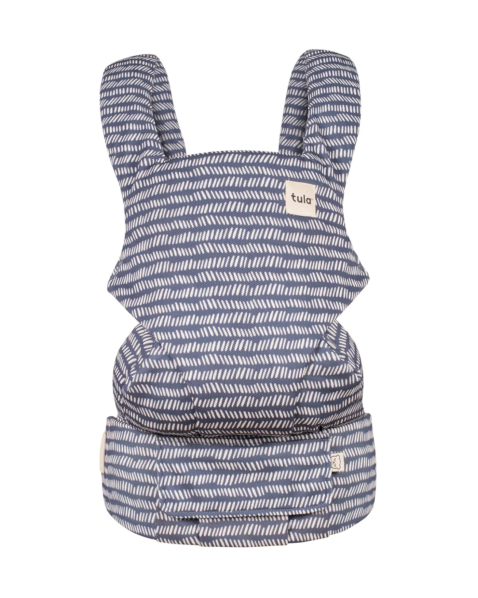 A baby carrier by Tula with a navy blue and white hand-drawn line pattern, shown against a plain white background.