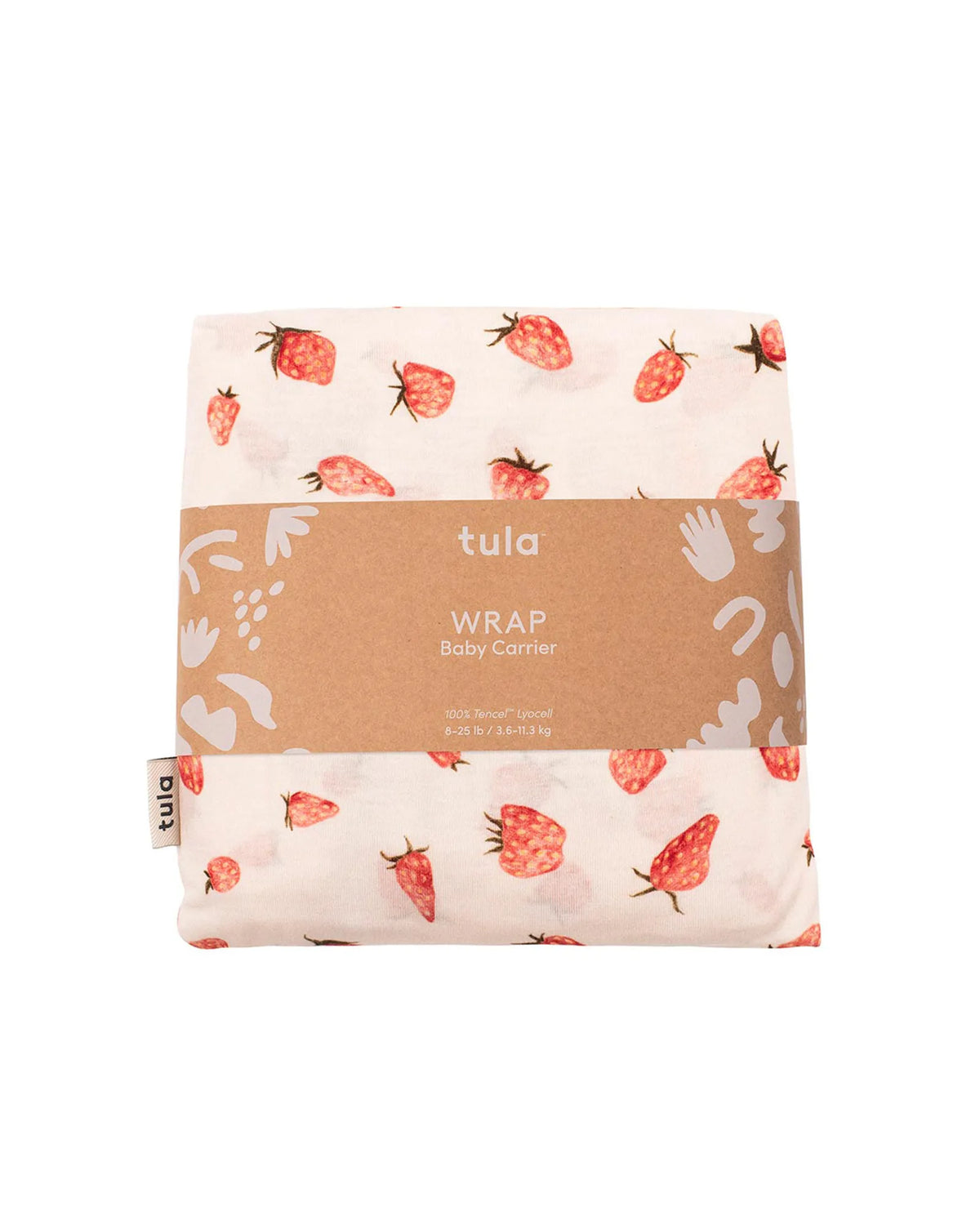 A folded Tula baby wrap with a strawberry pattern, wrapped in a brown paper band label.